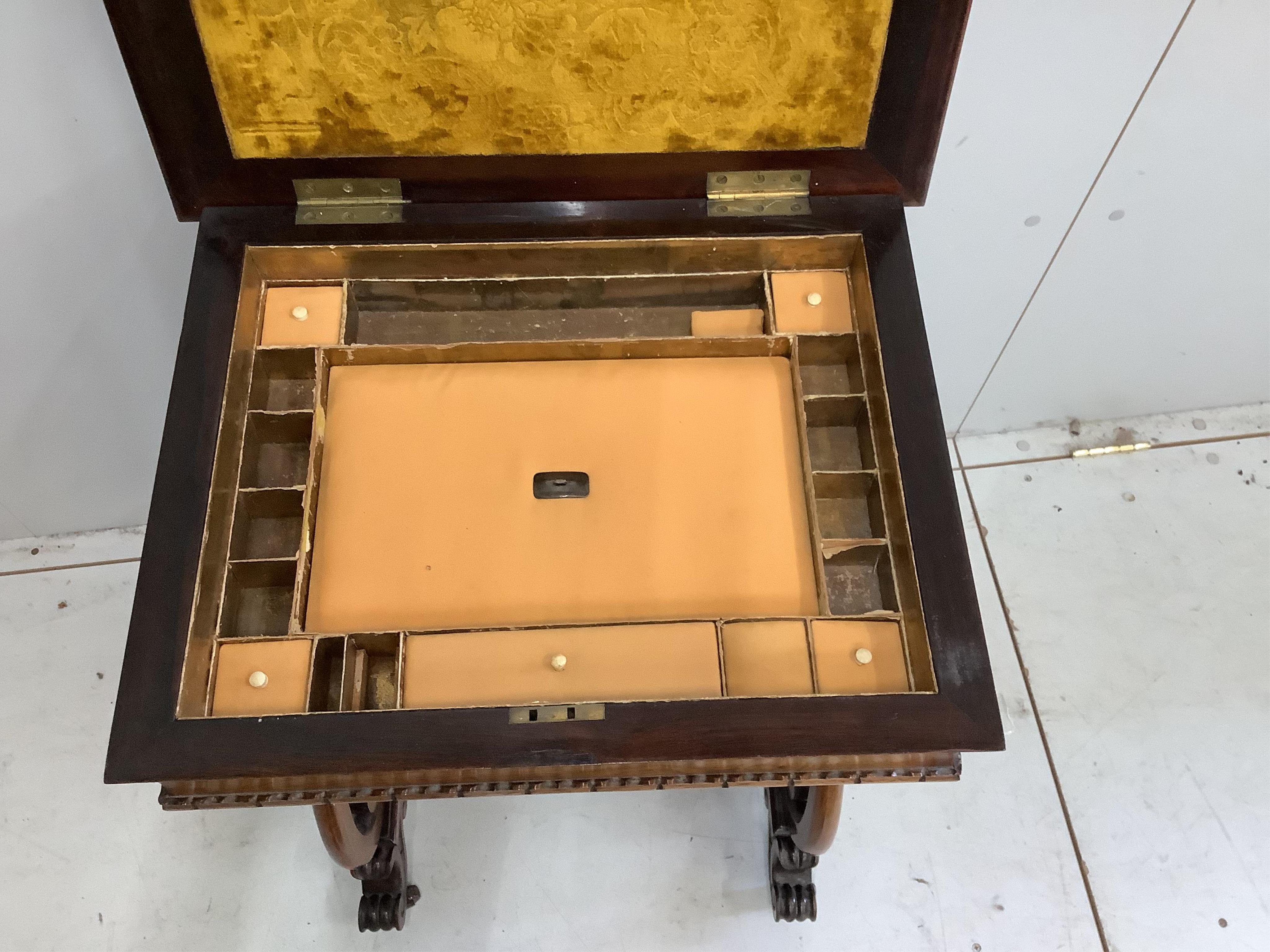 A Victorian rosewood work table, width 56cm. Condition - top faded, otherwise good